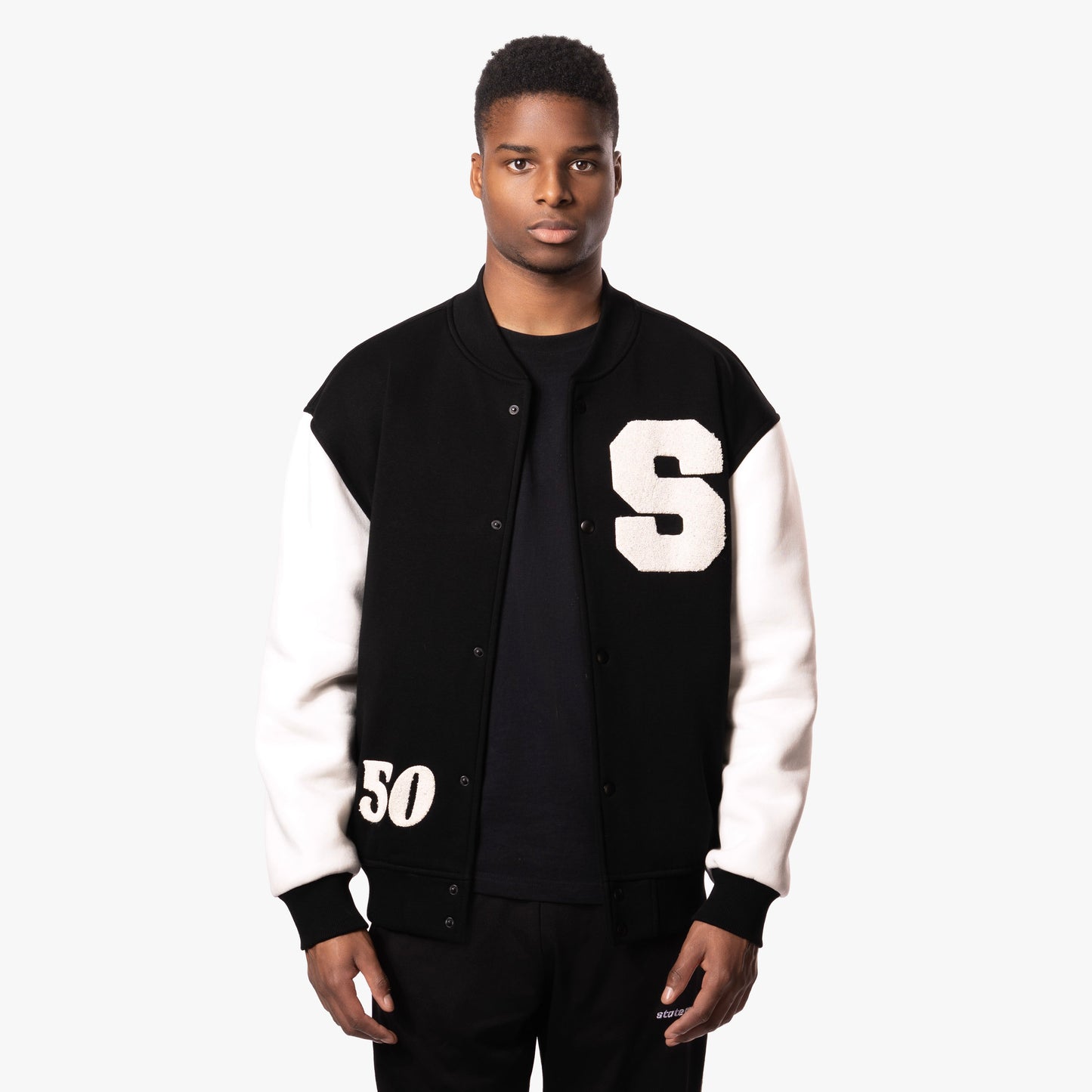 S BADGE VARSITY JACKET