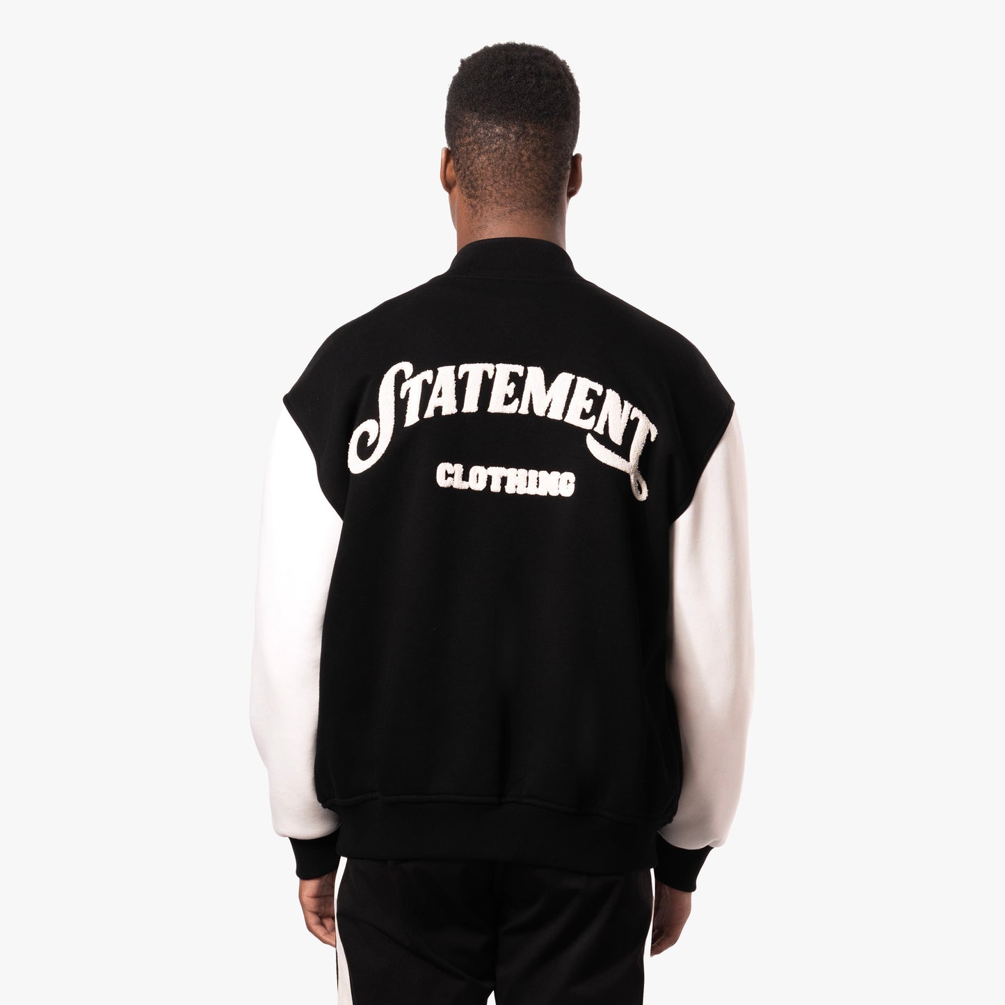 S BADGE VARSITY JACKET