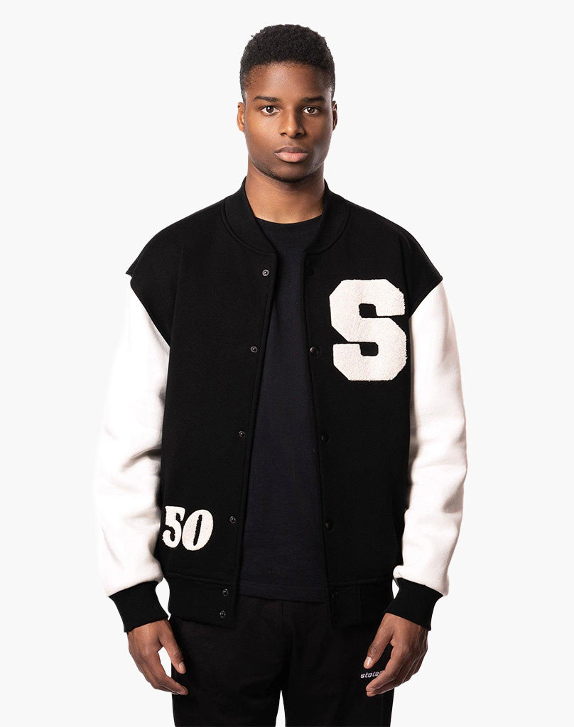 S BADGE VARSITY JACKET